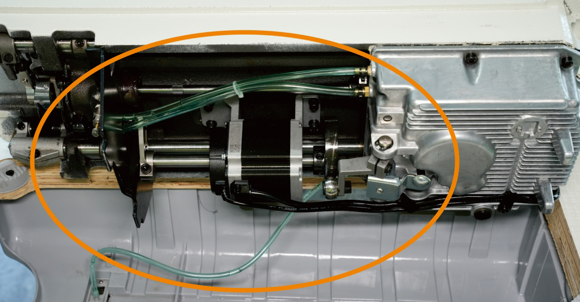 Sealed Oil Pan Design for Cleaner Sewing Operation